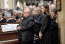Andrew Christer, Alison Gill and the choir are both pleased and moved